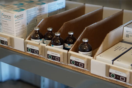 Veterinary medicine bottles on a shelf
