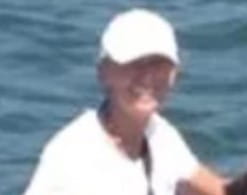 Julie Zitz on boat with dogs